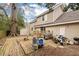 Back of a multi-story home with a wooden deck at 2 Pony Ln, Charleston, SC 29407