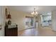 Cozy dining room with sliding doors and chandelier at 2 Pony Ln, Charleston, SC 29407