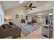 Bright living room with vaulted ceiling, fireplace, and skylight for natural light at 2 Pony Ln, Charleston, SC 29407