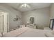 Cozy bedroom featuring neutral walls, an ornate vanity, and a comfortable bed with pink accents at 2005 Carriage Way, Summerville, SC 29485