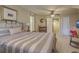 Spacious bedroom with a comfortable bed, ample natural light, and neutral décor, creating a peaceful retreat at 2005 Carriage Way, Summerville, SC 29485