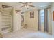 This bedroom has carpet, ceiling fan, and closet at 2005 Carriage Way, Summerville, SC 29485