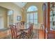 This dining room has a chandelier and wooden table at 2005 Carriage Way, Summerville, SC 29485