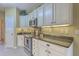 This kitchen features stainless steel appliances and granite countertops at 2005 Carriage Way, Summerville, SC 29485
