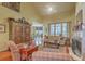 This stunning living room has beautiful hardwood floors, a fireplace, and lots of natural light at 2005 Carriage Way, Summerville, SC 29485