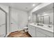 Clean, modern bathroom with double vanity, large mirror and walk-in shower at 207 West Bradford Pointe Dr, Summerville, SC 29486