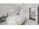 Well-lit bedroom with neutral decor, and easy access to an en-suite bathroom at 207 West Bradford Pointe Dr, Summerville, SC 29486