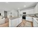 Modern kitchen with stainless steel appliances, granite countertops and a large center island at 207 West Bradford Pointe Dr, Summerville, SC 29486