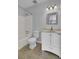Bathroom offers a tub shower combo, toilet, single sink vanity with storage, and light gray walls at 208 Greencastle Dr, Goose Creek, SC 29445