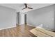 Bedroom features laminate wood flooring, a modern ceiling fan, and gray walls at 208 Greencastle Dr, Goose Creek, SC 29445