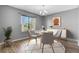 Cozy dining room with modern decor and a large window showcasing the outdoor view at 208 Greencastle Dr, Goose Creek, SC 29445