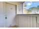 Front door view features the unit number, a locked Primary Lock, and some green trees at 208 Greencastle Dr, Goose Creek, SC 29445