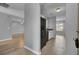 Kitchen and dining room featuring appliances, laminate flooring, and modern paint at 208 Greencastle Dr, Goose Creek, SC 29445