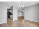 Open-concept living area with a combined living area, kitchen, and view of a ceiling fan at 208 Greencastle Dr, Goose Creek, SC 29445