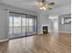 Bright living room with fireplace and sliding glass door with great natural light at 208 Greencastle Dr, Goose Creek, SC 29445