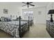 Bedroom featuring two beds, a ceiling fan and natural lighting at 213 Crossandra Ave, Summerville, SC 29483