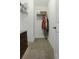 Walk-in closet with a shelf, hanging rod, and carpeted floor at 213 Crossandra Ave, Summerville, SC 29483