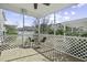 Covered porch offering a serene outdoor living space at 213 Crossandra Ave, Summerville, SC 29483