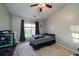 Bedroom featuring a ceiling fan, neutral paint, carpet flooring, and window with curtains at 240 Island Green Rd, Goose Creek, SC 29445