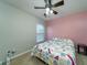 Colorful bedroom with ample natural light, a cozy bed, and stylish accents at 240 Island Green Rd, Goose Creek, SC 29445