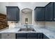 Modern kitchen featuring granite countertops, stainless steel appliances, and a double basin sink at 240 Island Green Rd, Goose Creek, SC 29445