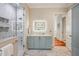 Modern bathroom with glass shower, vanity, and marble floors at 2455 The Haul Over, Seabrook Island, SC 29455