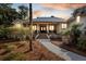 Stately home with a covered porch, columns, and a brick staircase leading to double front doors at 2455 The Haul Over, Seabrook Island, SC 29455