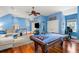 Bright game room with a pool table, comfortable seating, and a view of the outdoors at 2455 The Haul Over, Seabrook Island, SC 29455