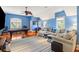 Spacious game room featuring a pool table, comfortable seating, and ample natural light at 2455 The Haul Over, Seabrook Island, SC 29455