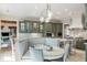 Eat-in kitchen with booth seating, pendant lighting, and open layout at 2455 The Haul Over, Seabrook Island, SC 29455