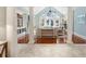 Spacious living area featuring hardwood floors, pillars, and views into additional living spaces at 2455 The Haul Over, Seabrook Island, SC 29455