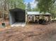 This property features covered storage for equipment and recreational vehicles at 2595 Bohicket Rd, Johns Island, SC 29455