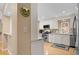 Bright kitchen with white cabinets, stainless steel appliances, and hardwood floors offering a modern feel at 2653 Seabrook Island Rd, Seabrook Island, SC 29455