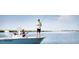 Couple enjoys fishing from their boat in the intracoastal waterway of their waterfront community at 2653 Seabrook Island Rd, Seabrook Island, SC 29455