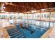 Bright, airy indoor pool with lap lanes and comfortable seating for relaxation at 2653 Seabrook Island Rd, Seabrook Island, SC 29455