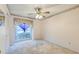 Bedroom featuring a ceiling fan, closet, carpet flooring and a window at 306 Runnymede Ln, Summerville, SC 29485