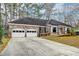 Exterior view of a single-story brick house with a ramp and attached garage at 306 Runnymede Ln, Summerville, SC 29485