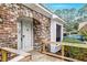 Close-up view of brick entryway and ramp leading to front door of home at 306 Runnymede Ln, Summerville, SC 29485