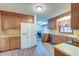 Kitchen area with wood cabinets, stainless steel appliances, and views into breakfast nook at 306 Runnymede Ln, Summerville, SC 29485