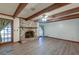Living room featuring a brick fireplace, ceiling fan, and hardwood style floors at 306 Runnymede Ln, Summerville, SC 29485