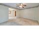 Spacious living room showcasing beautiful chair rail, crown molding and adjoining dining space at 306 Runnymede Ln, Summerville, SC 29485