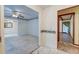 View into the living room with chair rail, wallpaper, and an open floorplan at 306 Runnymede Ln, Summerville, SC 29485