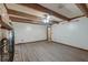Spacious living room featuring exposed wood beams and a fireplace at 306 Runnymede Ln, Summerville, SC 29485