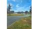 Scenic water view with a grassy field at 306 Runnymede Ln, Summerville, SC 29485