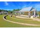 Community amphitheater with terraced seating and landscaped surroundings for outdoor events at 3115 Cross Vine Ln, Summerville, SC 29483