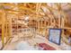 A spacious unfinished attic reveals the home's underlying structure and presents opportunities for customization at 3115 Cross Vine Ln, Summerville, SC 29483