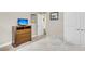 This bedroom features a dresser with TV, two closets, and neutral wall color at 3115 Cross Vine Ln, Summerville, SC 29483