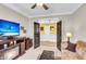 Inviting living room featuring a cozy fireplace and an open doorway to another room at 3115 Cross Vine Ln, Summerville, SC 29483