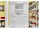 Organized pantry featuring ample storage with shelves, wine wrack and drawers at 3115 Cross Vine Ln, Summerville, SC 29483