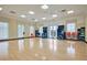 Bright yoga studio with hardwood floors, a ceiling fan, and natural light from large windows at 3115 Cross Vine Ln, Summerville, SC 29483
